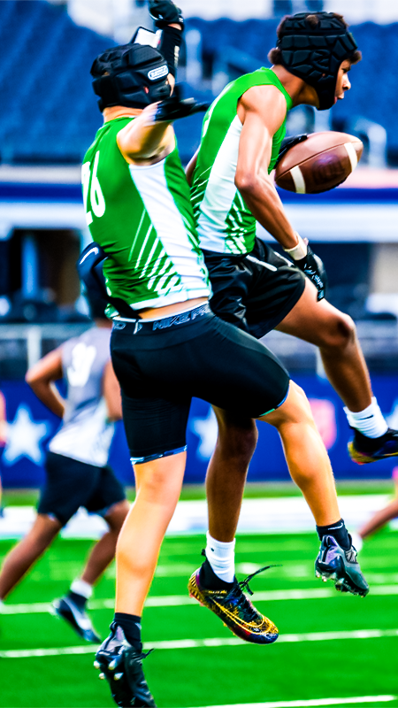 Two players celebrating mid air