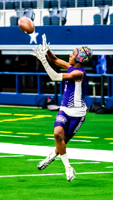 Player catching football